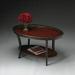 Butler Specialty Traditional Red and Black Oval Cocktail Table